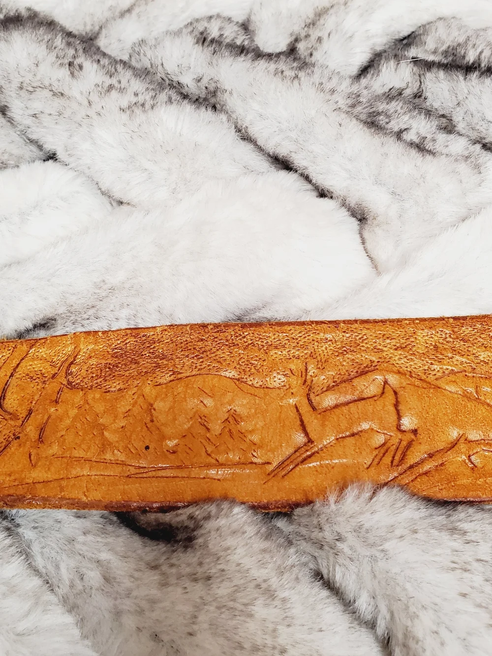 Vintage hand-tooled leather belt features a distinctive Viking Valknut symbo